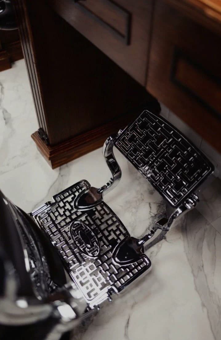 Metal hair clipper on the marble counter